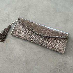 Never used new Mondrina clutch made in Peru 100% leather